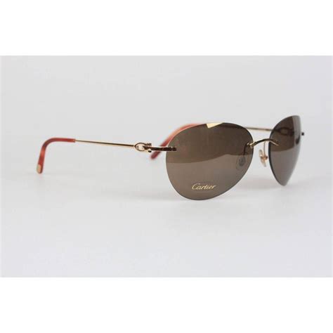 CARTIER Paris Rimless Gold Havana Sunglasses T8200549 .